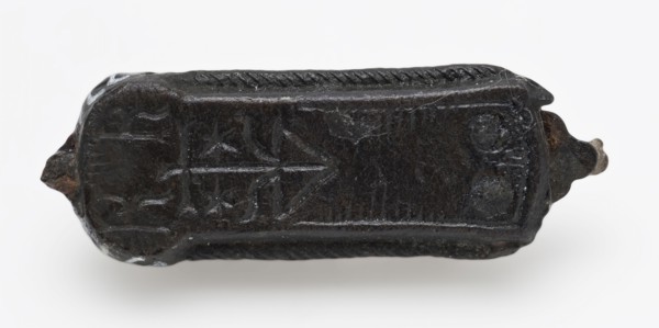 Elongated fittings with private label, batter ground find tin iron metal, cast Oblong hewn Decorated in high relief on one side