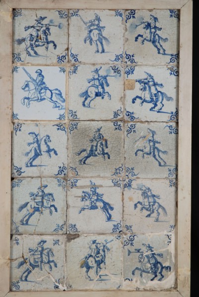 Tile field, fifteen tiles, blue on white, riders, corner motif of ox's head, tiled field wall tile tile sculpture ceramics