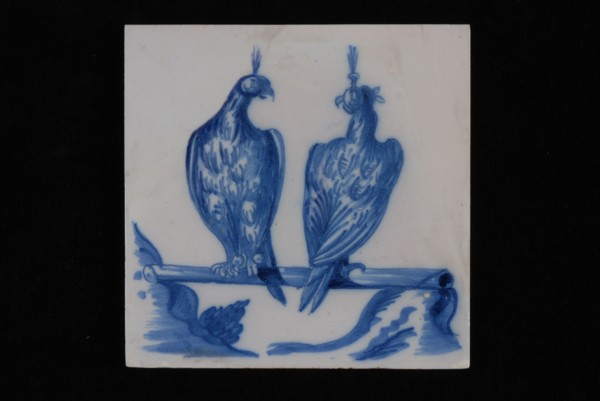 Jan Aalmis sr., Blue white tile with two falcons sitting on stick, wall tile tile sculpture ceramic earthenware glaze, baked 2x