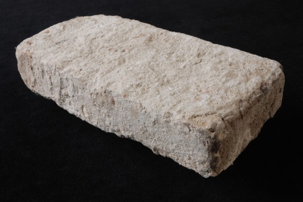 Gray-yellow brick, brick building material earth discovery ceramics pottery, in form made baked archeology indigenous brick