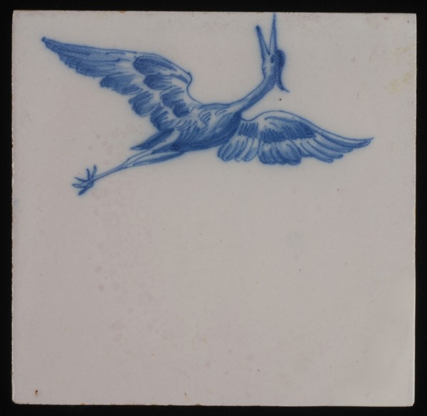 Jan Aalmis sr., Tile, blue on white, with the image of heron with spread wings and with opened beak, wall tile tile sculpture