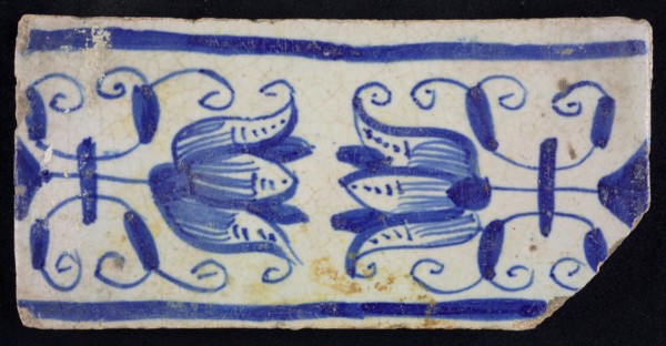 Blue border tile, waving floral pattern with tulips, above and below blue border, border tile wall tile tile sculpture ceramic