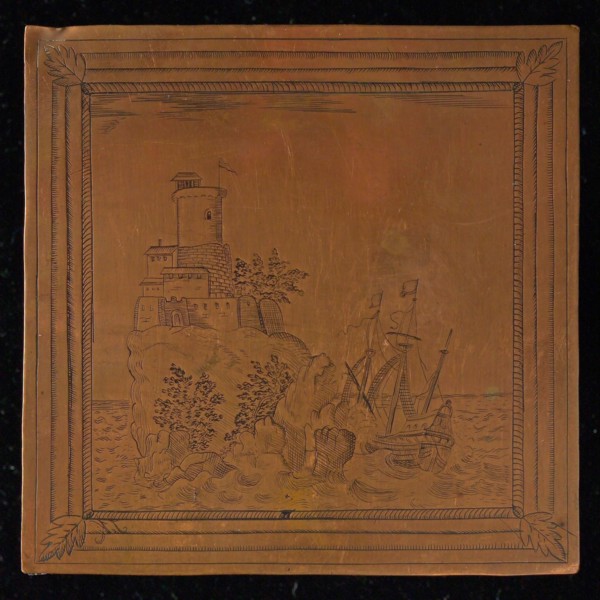 Copper cliché with ship and tower on rock, cliché printing equipment copper, engraved Red copper plate with three-master