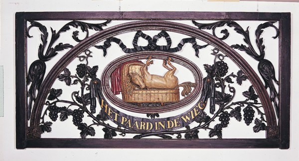 Carved cross-light and entitled: The Horse in the Cradle, cutting frame light wood carving sculpture sculpture building part
