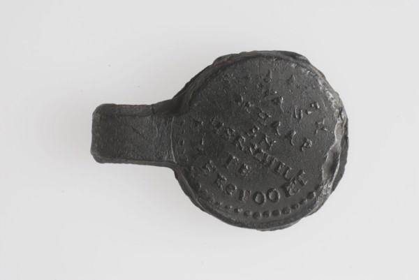 Sheet of cloth with SCHAAP AND HERSCHEL AMERSFOORT, cloth seal hallmark soil find lead metal, quality mark for too thin
