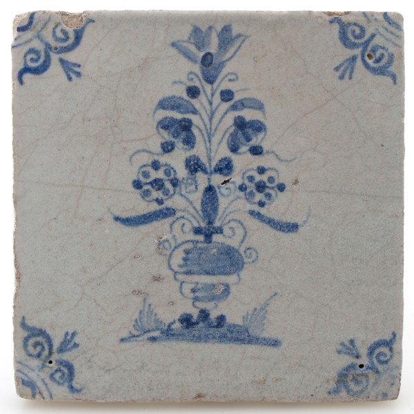 Earthenware tile with flower vase and ox head corner decoration in blue on white ground, wall tile tile visualization earth