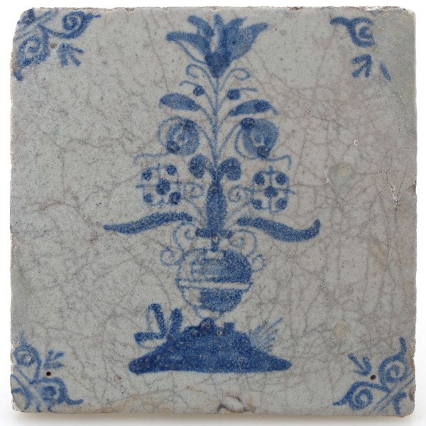 Pottery tile with flower vase and ox head corner decoration in blue on white background, wall tile tile visualization earth