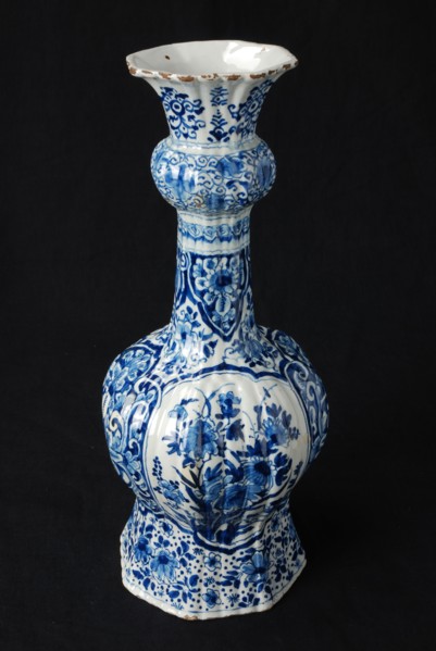 White vase with blue decoration of flowers, knob vase vase crockery holder ceramic earthenware glaze, baked painted glazed part