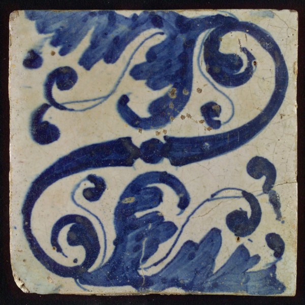 Tile, blue on white, diagonally an S-shaped volute and stylized leaf ornaments, tile picture footage fragment ceramics pottery