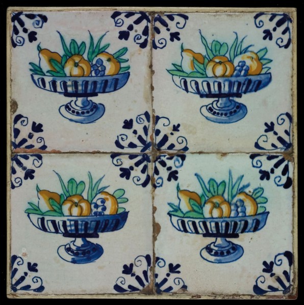 Tile field, four tiles, fruit decor, orange, yellow, green and blue on white, fruit bowl on foot, corner motif, tiled field wall