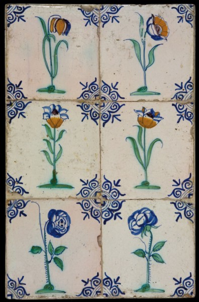 Tile field, six tiles, four with orange, green and blue on white, two with green and blue, flower on ground, corner pattern ox