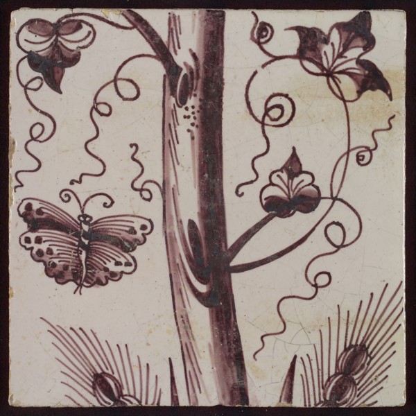 Tile of purple pilaster with tree trunk with curled twigs, leaves, bunches of grapes and around it butterflies and ears of corn