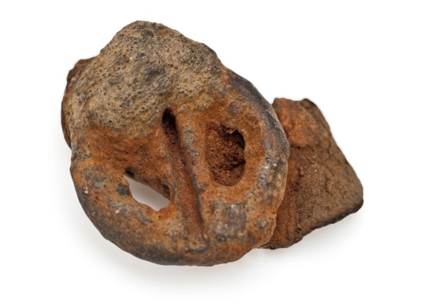 Small shoe buckle with leather fragment, buckle fastener component soil find brass leather metal, archeology Rotterdam City