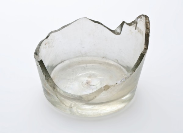 Bottom fragment of drinking glass with radgraving, clear glass, pontilmark, goblet drinking glass drinking utensils tableware