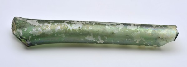 Glass tube or neck, cylindrical and pinched on one side, glass soil found glass, w 1.9 hand-blown Glass tube Possible neck
