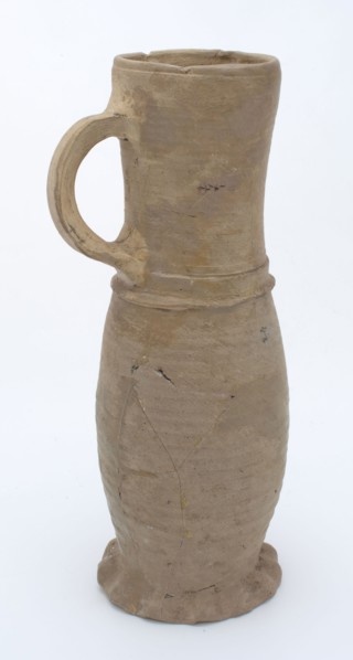 Stoneware Jug or jacobakan, jug on pinched foot with slightly curved body and cylindrical neck, deformed, Jug or jacobakan jug