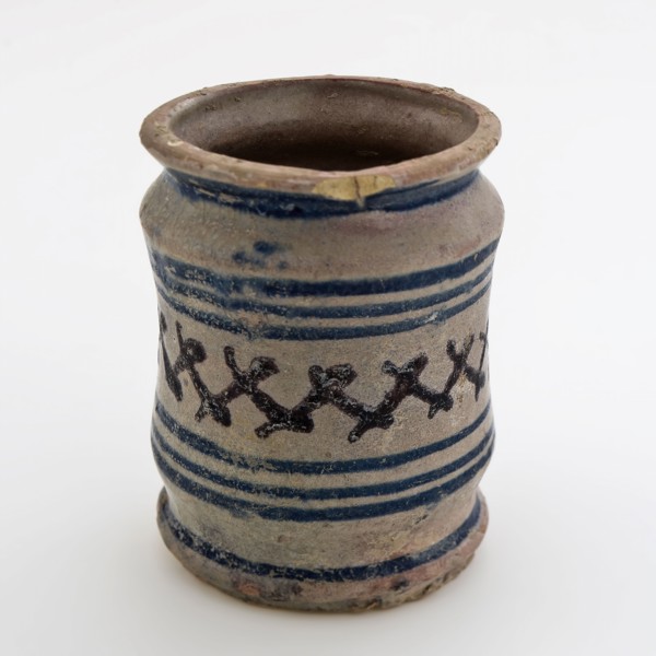 Pottery ointment jar, majolica albarello with two constrictions, blue rings and cross decor in manganese, albarello holder soil