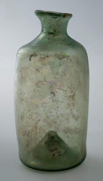 Small cylindrical bottle with round shoulder and slender, short neck, bottle holder soil find glass h 9.4 free blown Small
