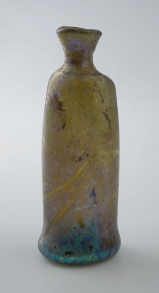 Small cylindrical bottle with round shoulder and narrow neck, bulging foot, bottle holder bottomfound glass, free blown Small