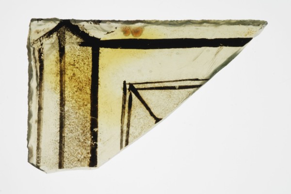 Corner fragment of green window glass with stained-glass decor, plinth or frame, window glass building material soil find glass