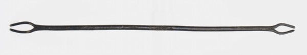 Long brass pen with two open, oval eyes at the ends, fines needle?, penalty needle? Soil discovery copper brass metal, w 1.1