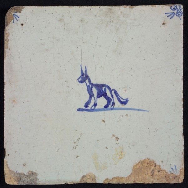Animal tile with dog, small and blue decor on white ground, corner filler ox head, wall tile tile sculpture ceramic earthenware