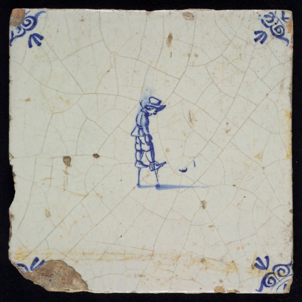 Wijtmans, Scene tile, child's play, stilt walking, corner filling ox's head, wall tile tile sculpture ceramics earthenware glaze