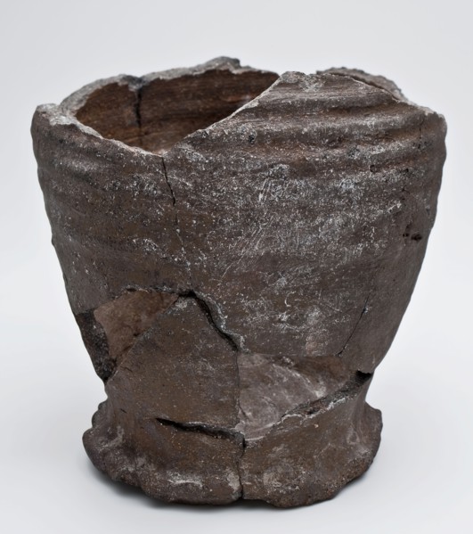 Bottom of jug on pinched foot, smeared with engobe, proto-stoneware, jug fragment soil find ceramic stoneware clay engobe, hand