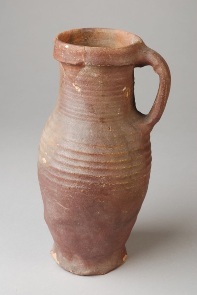 Proto-stoneware jug, purple-brown engobe, pinched foot, jug crockery holder soil find ceramic stoneware clay engobe, twisted