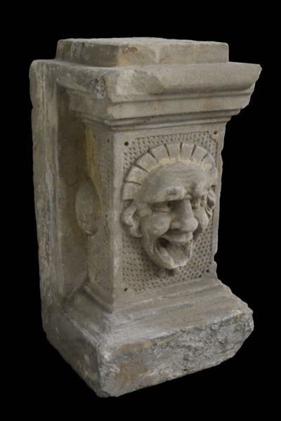 Basement with head old woman, basement ornament building component sandstone stone, sculpted Rectangular basement in the middle