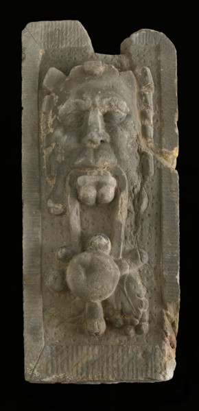 Cornerstone with gable head, satyr with fruit, keystone gable ornament building component sandstone stone, sculpted