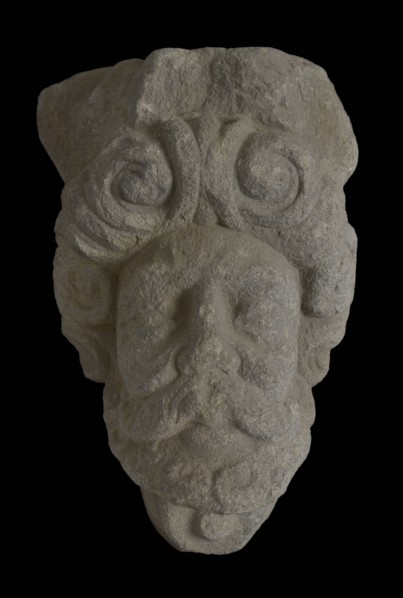 Console with male head, console building element sandstone stone, sculpted Console with male head surrounded by curls