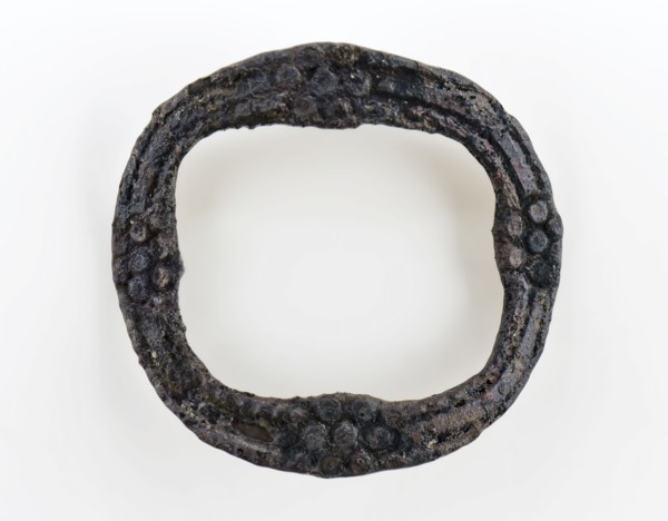Small graceful buckle, oval and decorated with rosettes, buckle fastener component soil find copper tin? metal, Oval bracket