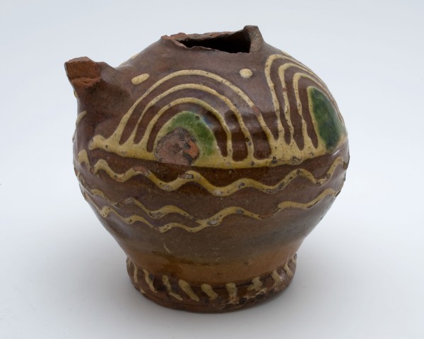 Pottery jug decorated with sludge technology in yellow and green, oil can jar jar foundations ceramic earthenware clay engobe