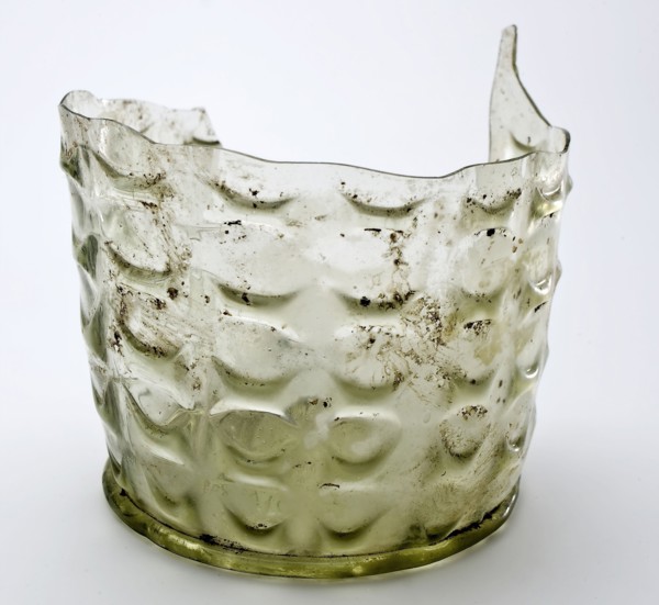 Fragment of stand ring, bottom and part wall of waffle cup, beaker drinking glass drinking utensils tableware holder soil find