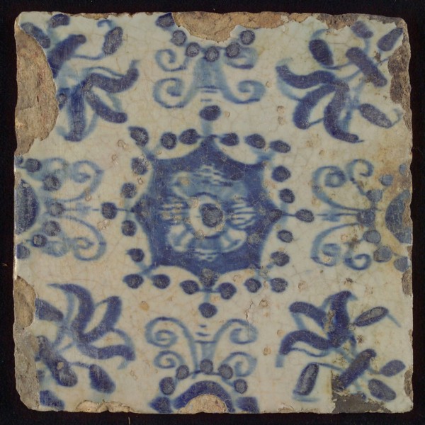 Tile, blue on white, central flower within star shape, three-piece around, half rosette, corner pattern lily, wall tile