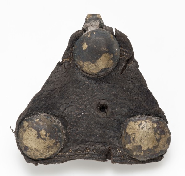 Triangular riveted piece of batter with hook and remnant leather, fitting closure soil finding brass leather metal, whipped
