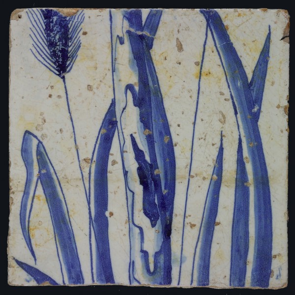 Blue tile with stems and ear of corn left, possibly belonging to chimney pilaster with 13 tiles, tree of bunches of grapes