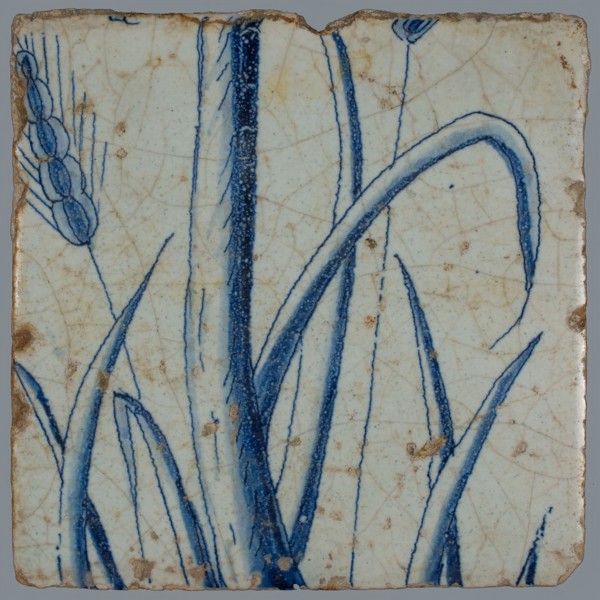 Blue tile with two ears of corn, leaf and stem, of chimney pilaster with 13 tiles, tree of bunches of grapes with birds, grain