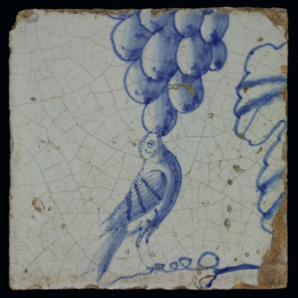 Blue tile with pecking bird to bunch of grapes, from pilaster with 39 tiles, tile pilaster footage fragment ceramic pottery