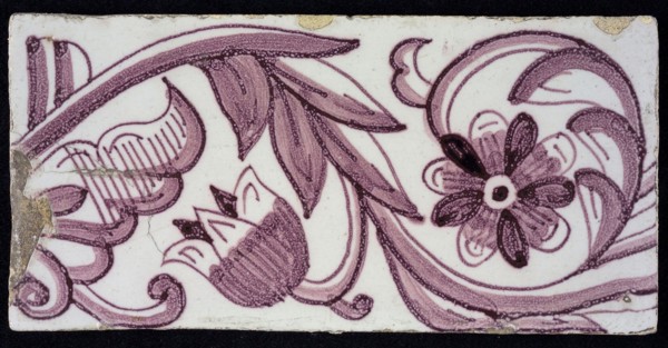 Rectangular edge tile in purple with tulip decor, with flower of ten oval petals, leaves, tulip fin, yellow pottery, border tile