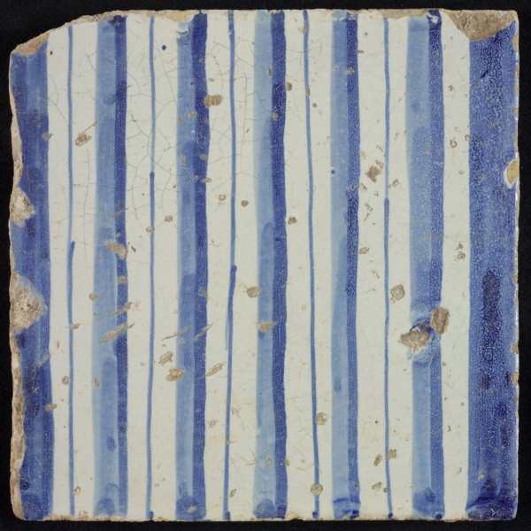 Tile of chimney pilaster, blue on white, part of column with cannelure, chimney pilaster tile pilaster footage fragment ceramic