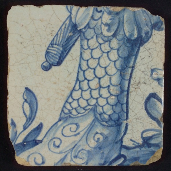 Tile with leg in blue armored with foot, tile picture footage fragment ceramics pottery glaze, d 1.1