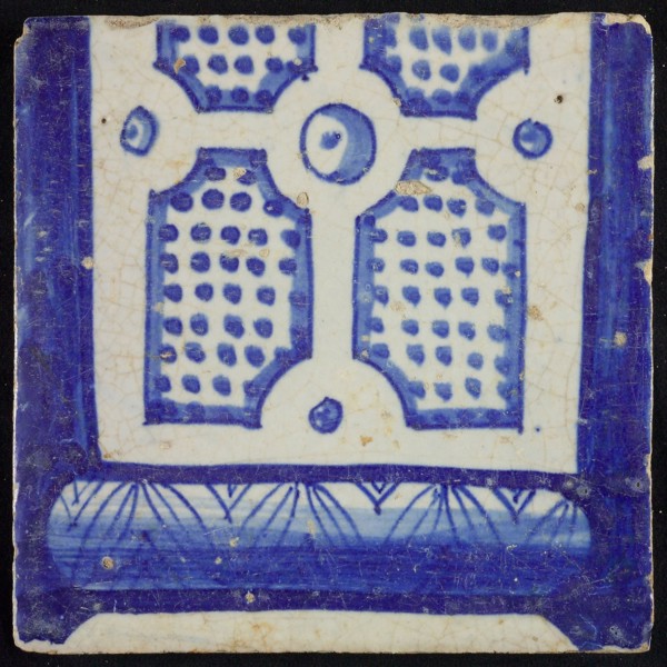 Tile of chimney pilaster, blue on white, bottom of column with basement, compartment with dots, chimney pilaster tile pilaster