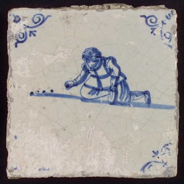 Scene tile, child's play, marbles, corner motif ox's head, wall tile tile sculpture ceramic earthenware glaze, baked 2x glazed