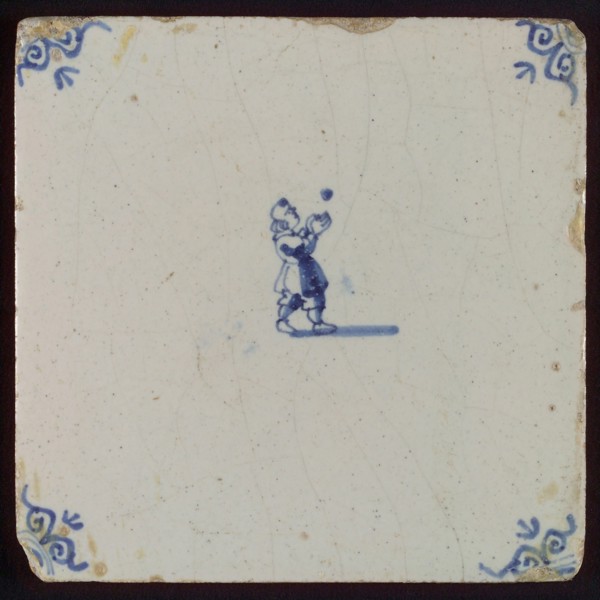 Scene tile, child's play, child with ball, corner motif ox's head, wall tile tile sculpture ceramic earthenware glaze, baked 2x