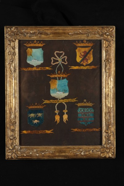 Coat of arms Van Hoogwerff with four trunk parts, painting footage watercolor wood glass paper, Coat of arms in frame behind