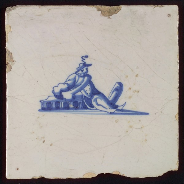 Figure tile, sitting figure, wall tile tile sculpture ceramic earthenware glaze, baked 2x glazed painted Blue on white