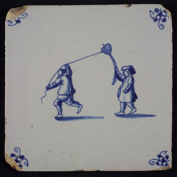 Scene tile, double child's play, kite flying, corner motif spider, wall tile tile sculpture ceramics pottery glaze tin glaze, in