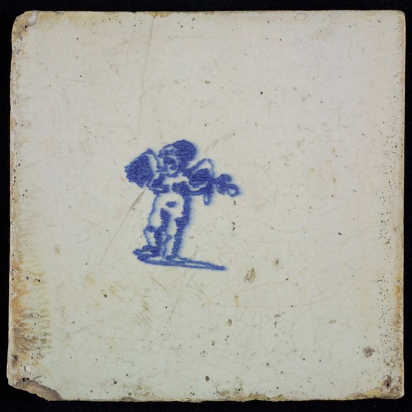 White tile with blue putto, wall tile tile sculpture ceramic earthenware glaze, baked 2x glazed painted, I